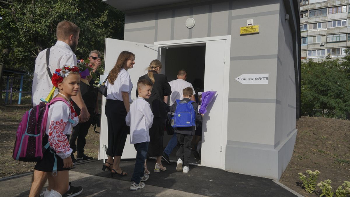 Ukrainian children return to school, with some attending classes in bomb shelters