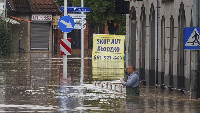 Mud, damage and displacement: Poland battles with severe flooding