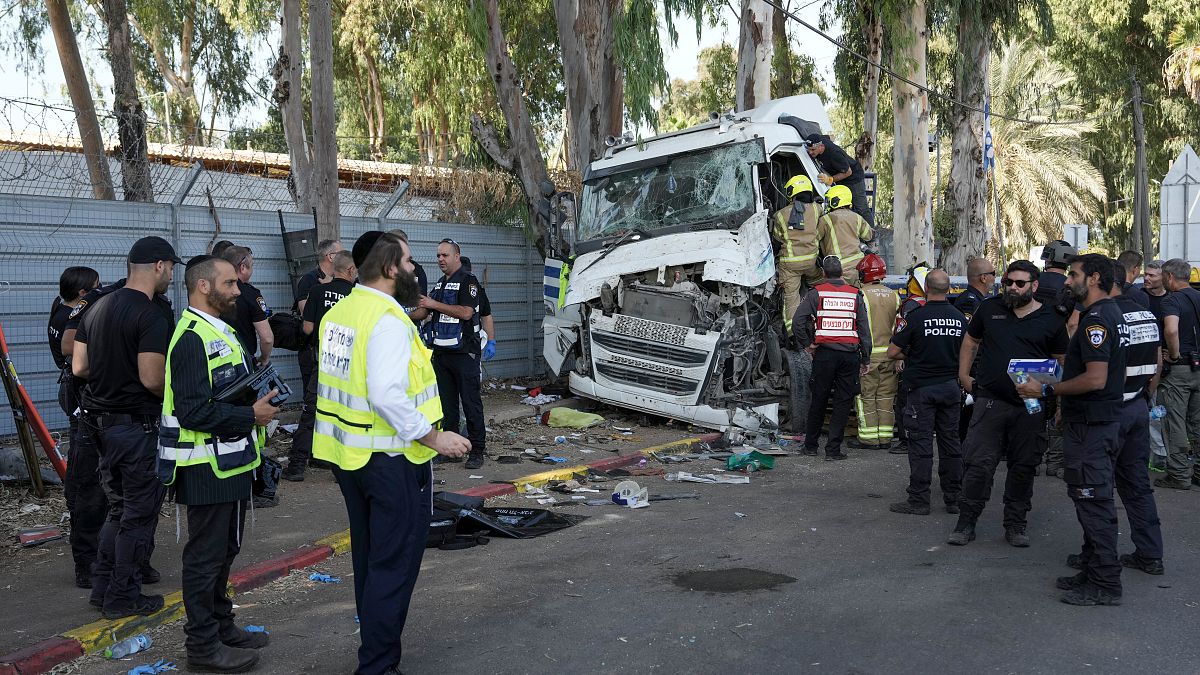 Truck rams into Tel Aviv bus stop, wounding dozens in suspected terror attack