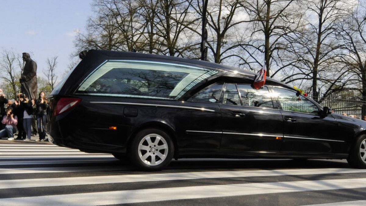 Funeral home in Poland apologises after corpse falls out of hearse in traffic