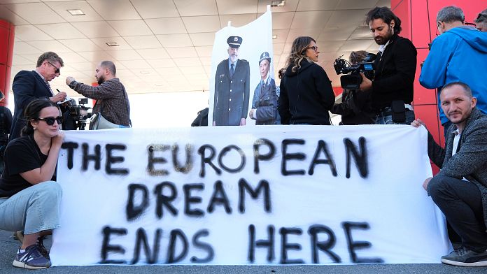 Activists protest as first group of 16 migrants on Italian ship arrive in Albania