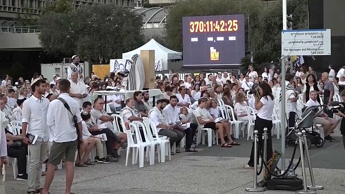 Hundreds of Israelis pray for hostages held by Hamas on holy day of Yom Kippur