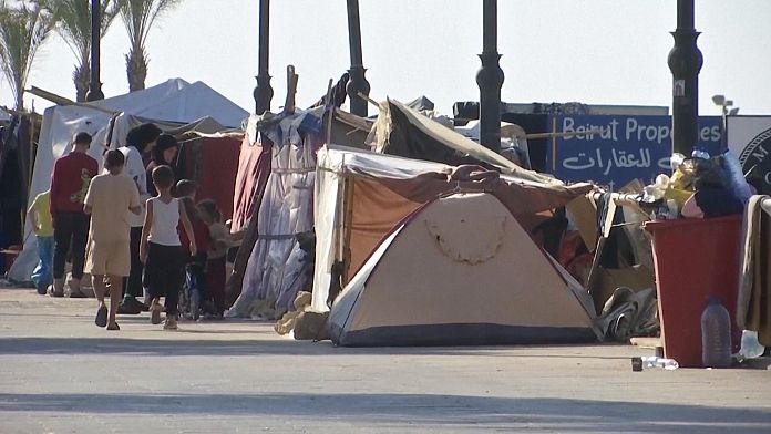 NO COMMENT: Aftermath of Israeli airstrikes in Beirut, displaced people seek shelter