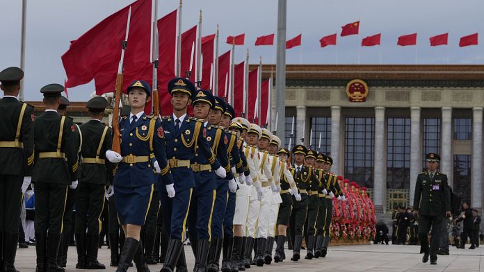 Xi warns of 'rough seas' as China celebrates 75 years of communist rule