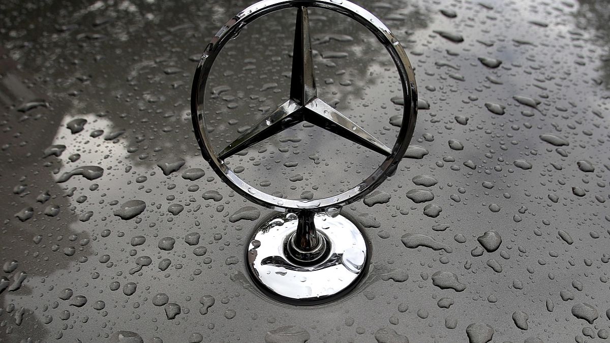 Mercedes-Benz may cut back on profit outlook as car market slows