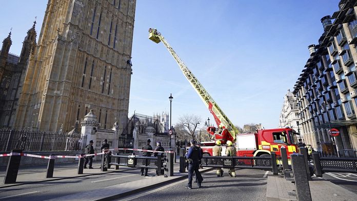 Pro-Palestinian protester climbs onto the UK parliament's tower