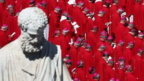 Getty Images Saint Peter's statue and cardinals during the funeral ceremony of Pope Francis