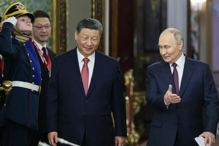 Xi calls for Ukraine peace deal “accepted by all parties” during Moscow visit