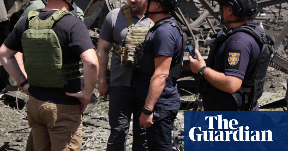 Ukraine war briefing: Russian attack on eastern region kills at least 19 as Zelenskyy flies in for Nato summit | Ukraine