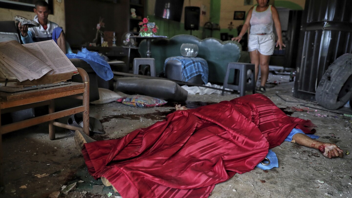 At least 7 killed in explosions and attacks outside police stations in southwest Colombia