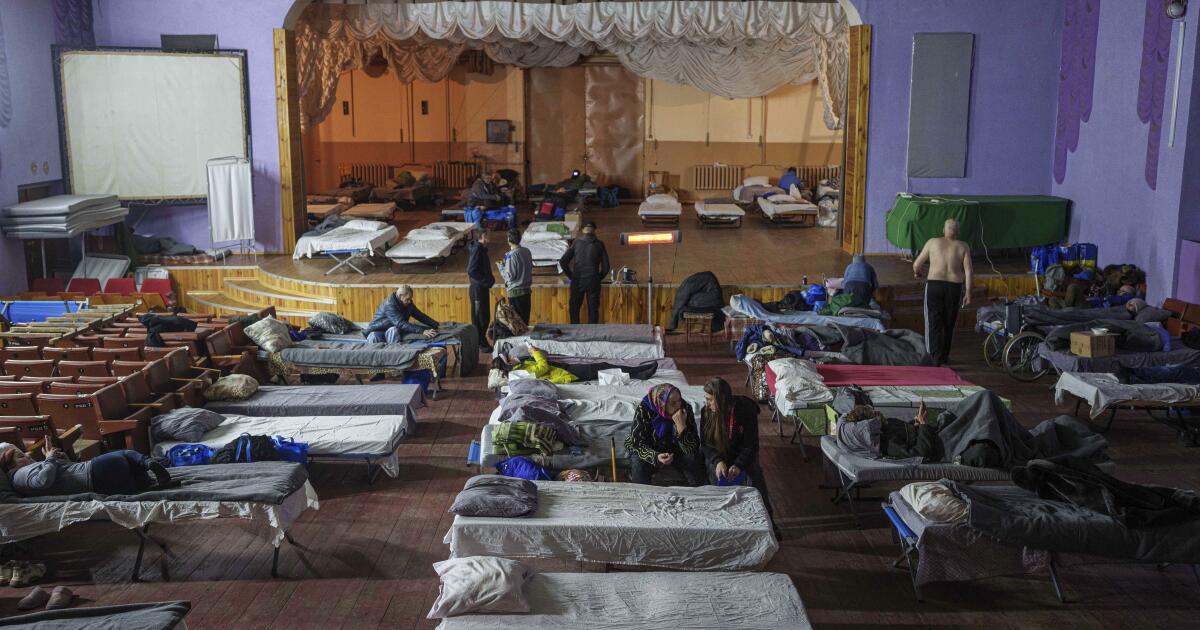 Russia, Ukraine trade blame over an attack on a boarding school