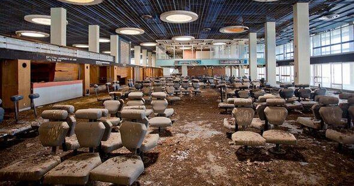 Inside abandoned European airport left to rot with chairs covered in faeces