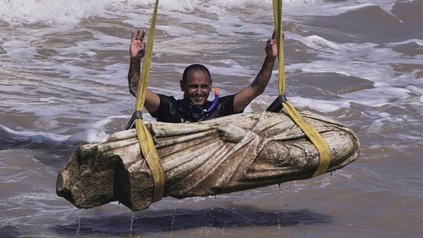 Photos from Egypt show archaeologists and divers recovering ancient artifacts from the seabed