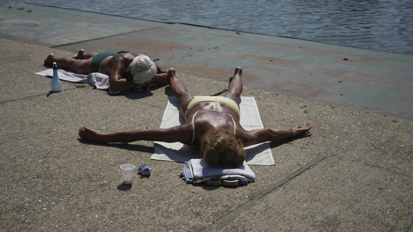 Parts of Europe burn as millions are facing record heat
