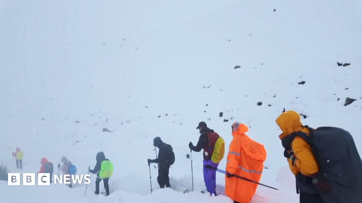 Mount Everest: Race to rescue 200 hikers continues after snowstorm – follow live