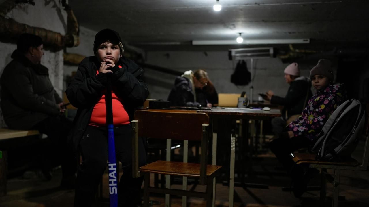 Photos show Ukrainians dealing with blackouts as Russia strikes energy infrastructure
