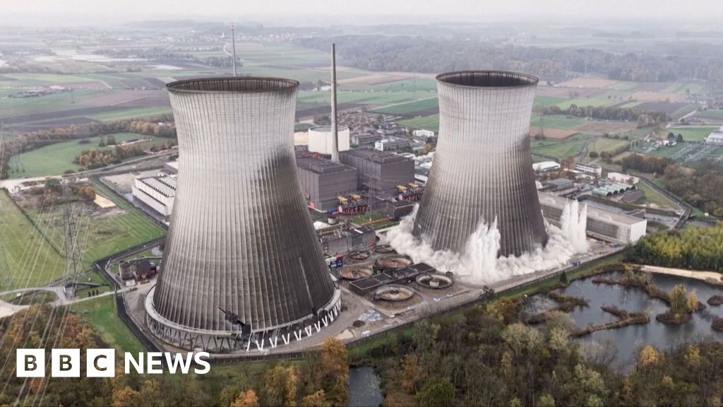 Moment nuclear plant towers collapse during demolition