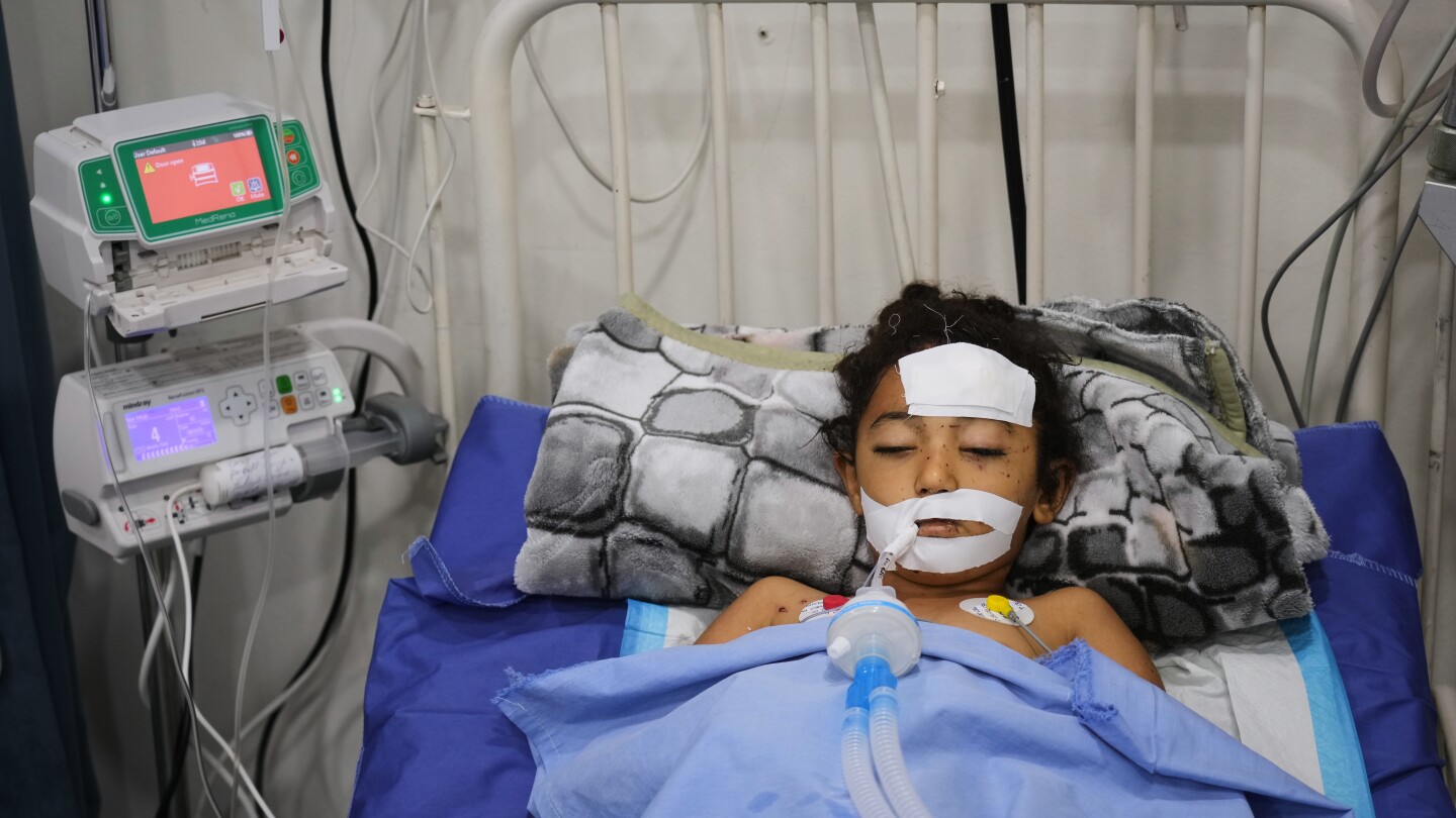 A bomb in Gaza’s rubble wounds twins who thought it was a toy