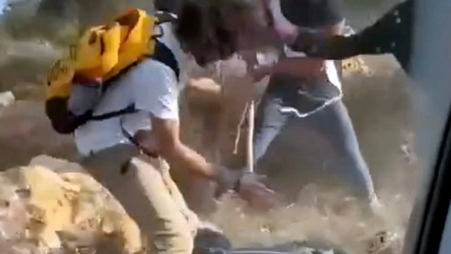Israeli settlers beat Palestinian farmers in attack captured on video