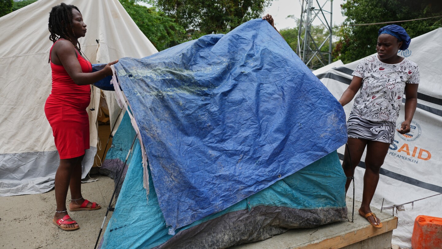 Tropical Storm Melissa nearly stationary in the Caribbean as a major flood threat