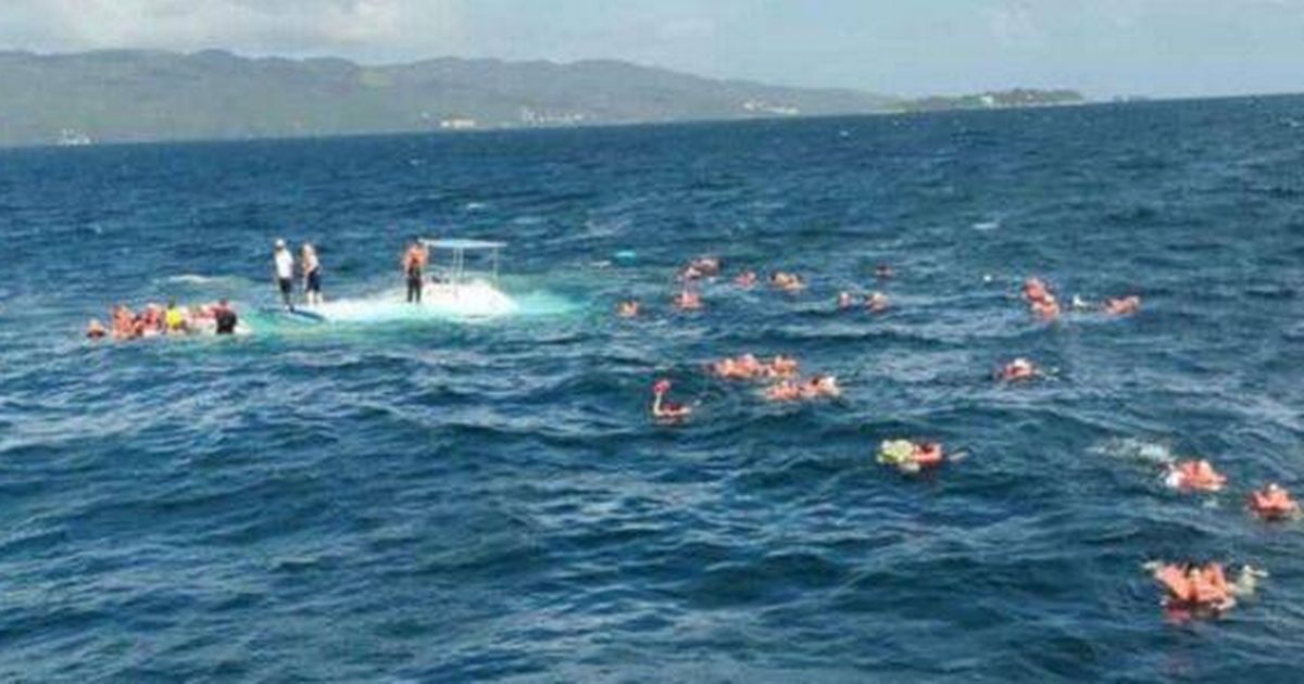 Panic at sea as cruise ship catamaran sinks leaving terrified tourists floating for their lives