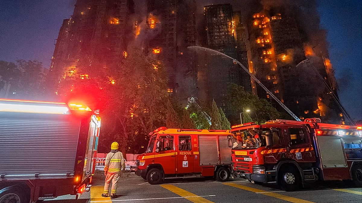 Thirteen dead as blaze engulfs Hong Kong residential complex