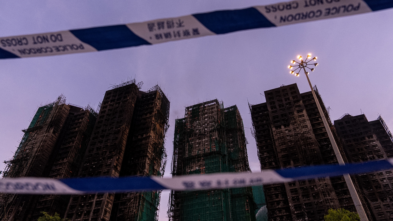 Hong Kong fire: Anti-corruption agency arrests 8 over apartment tower blaze as death toll raises to 128
