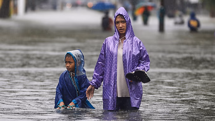At least 90 dead as floods and landslides hit Indonesia’s Sumatra island