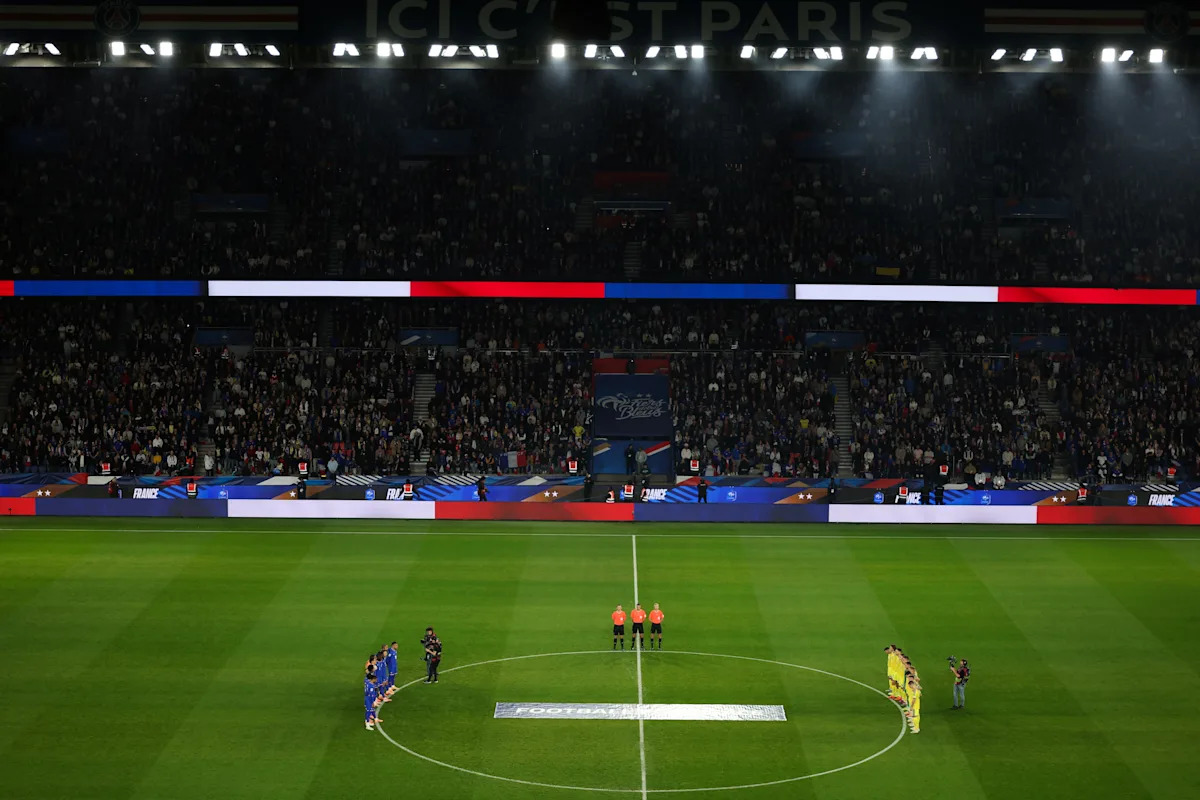 Players and fans remember victims of 2015 Paris terror attacks before France-Ukraine soccer match