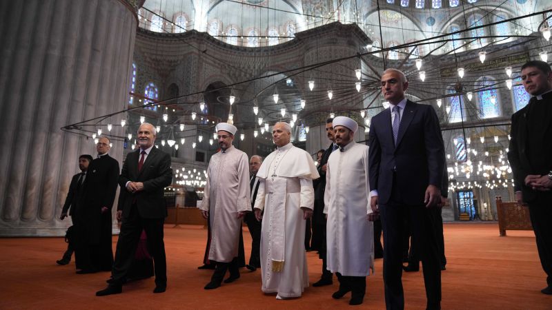 Pope Leo removes shoes but does not appear to pray in first mosque visit