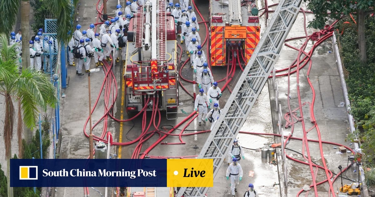 Hongkongers mourn fire victims at citywide condolence points; toll at 128