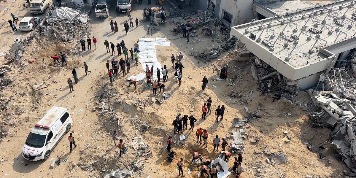 Rescue Teams Dig Up Over 50 Bodies Buried in Shallow Graves in Courtyard of Gaza City Clinic
