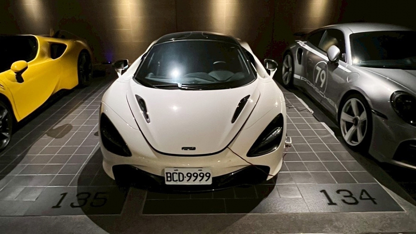 Prosecutors seize yachts, luxury cars from man accused of running Cambodia cyberscams : NPR