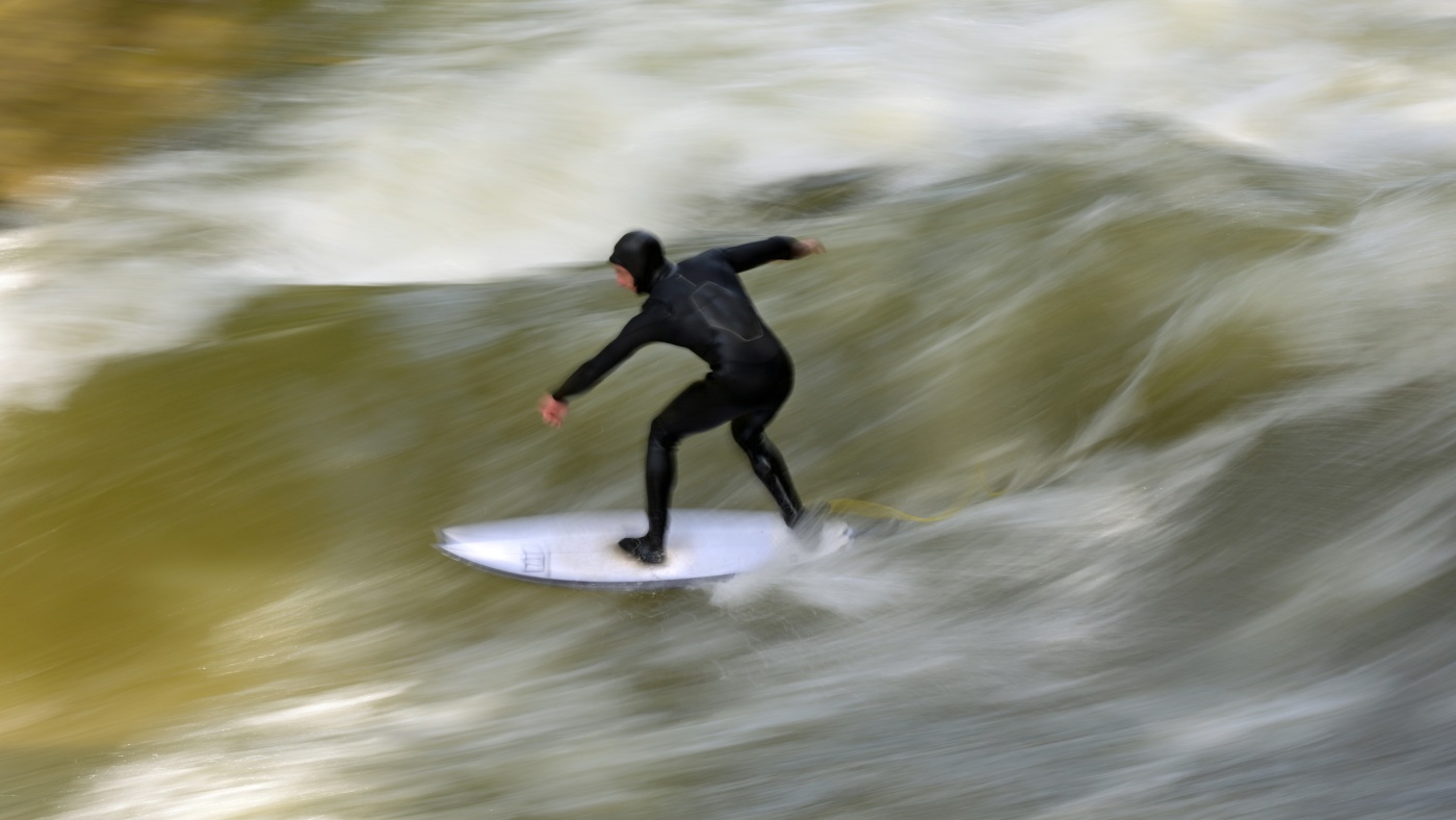 Munich’s Eisbach wave has flattened, frustrating surfers : NPR