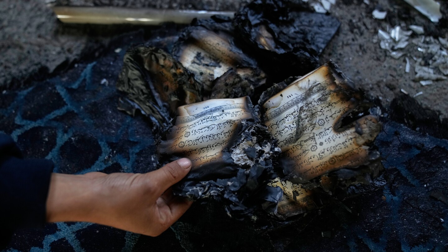 Israeli settlers torch a mosque and scrawl hateful messages after condemnation from military leaders