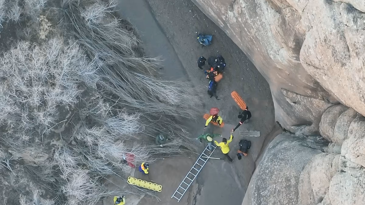Video. Moment hiker rescued from quicksand after activating SOS signal