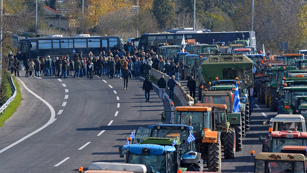 Greek farmers block Athens motorway as fallout from illegal subsidies fraud continues