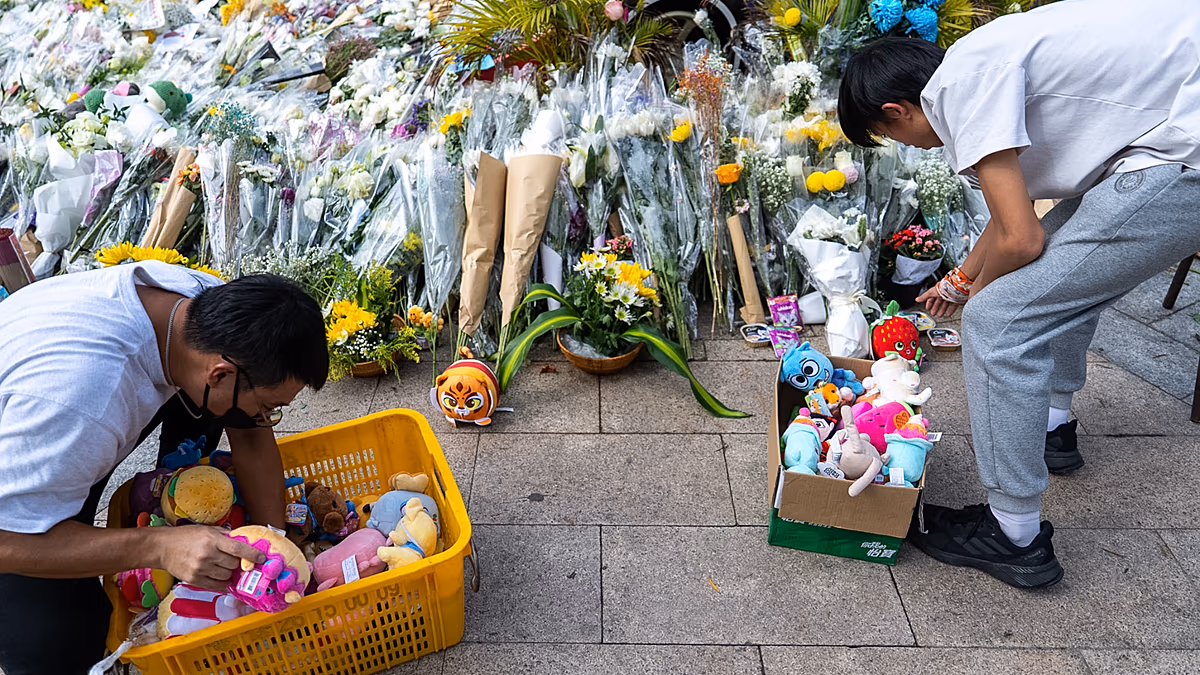 Video. Hong Kong mourners queue to pay respects after deadly Tai Po fire