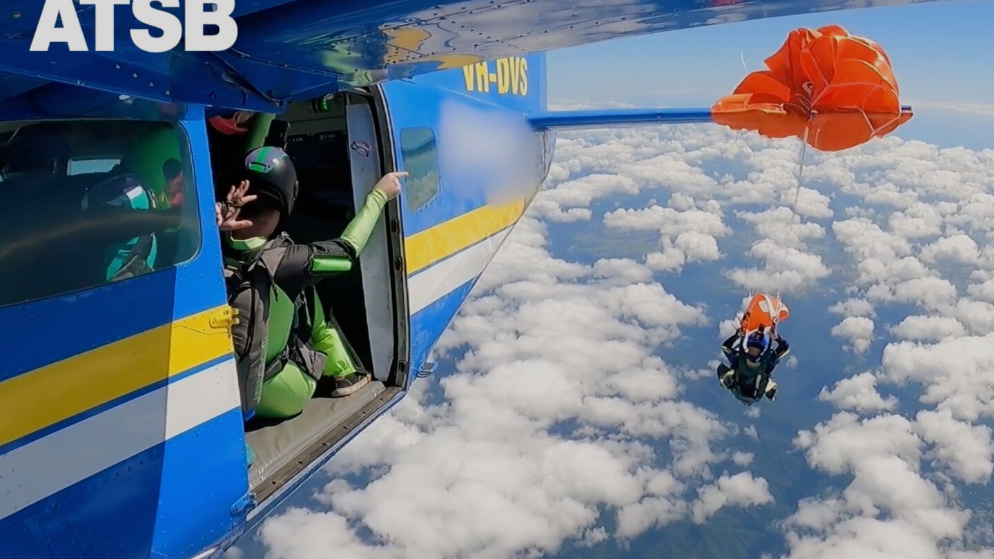 Skydiver dangles at 15,000 feet after parachute tangles on plane’s tail