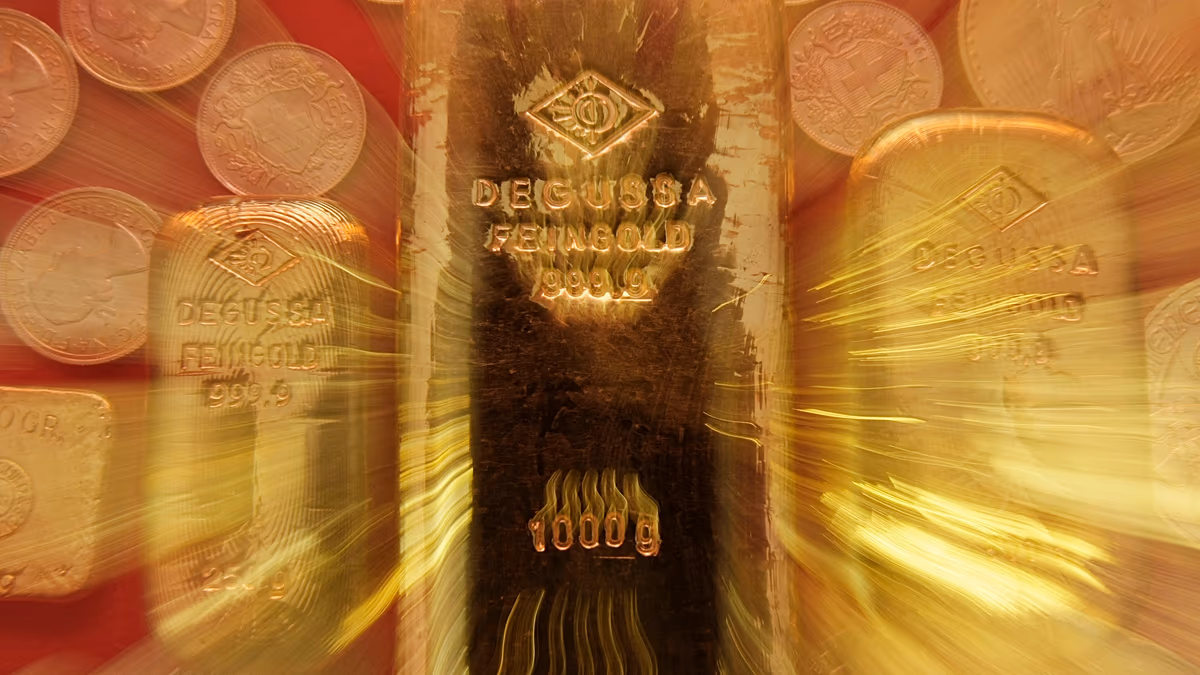 Gold rises to record high and stocks fall as Trump travels to Davos