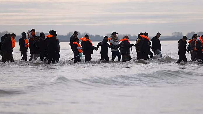 France imposes entry ban on 10 British far-right activists over anti-migrant activities