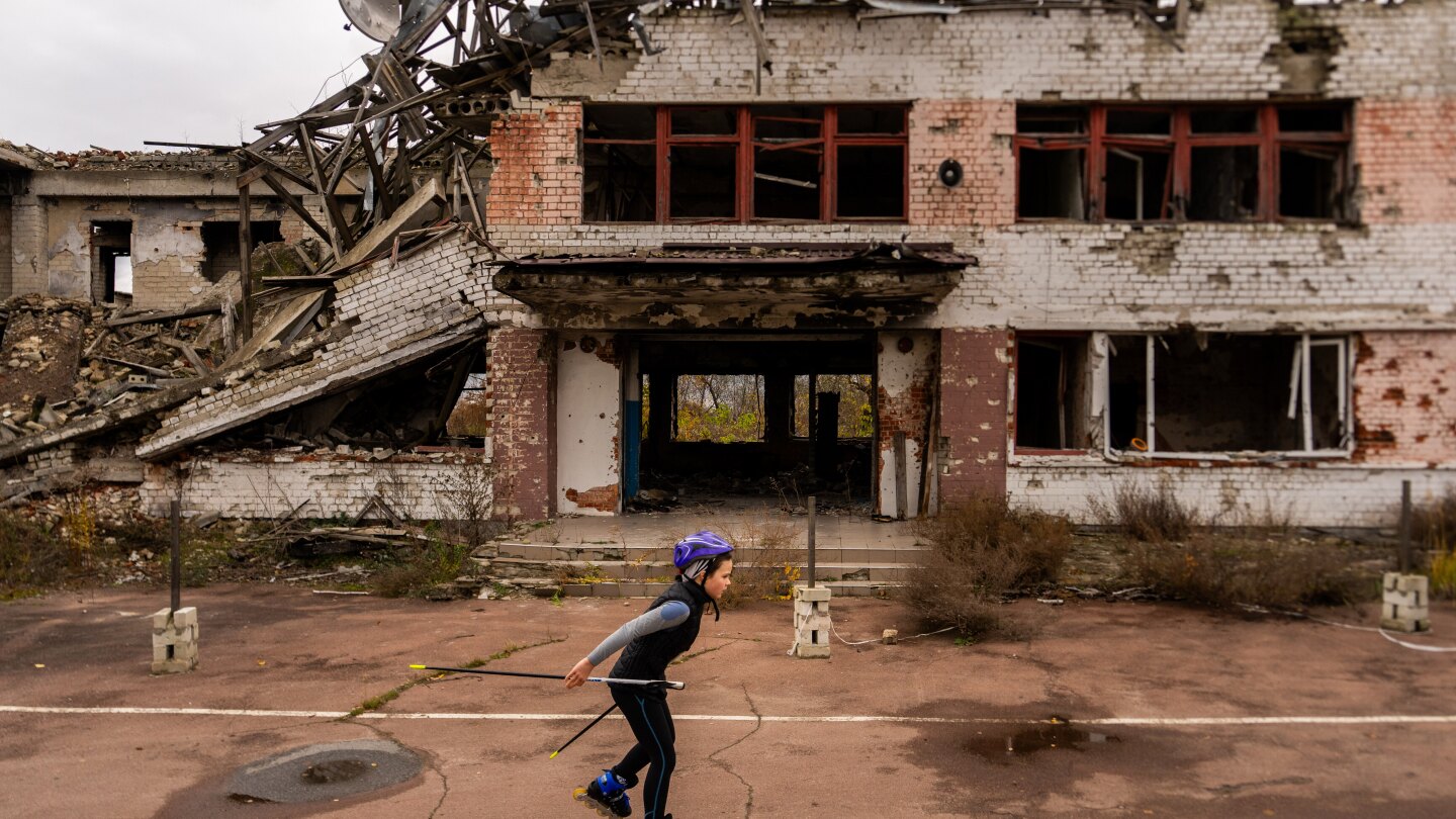 Ukraine’s cross-country skiers and biathletes train at a center ravaged by Russian attacks