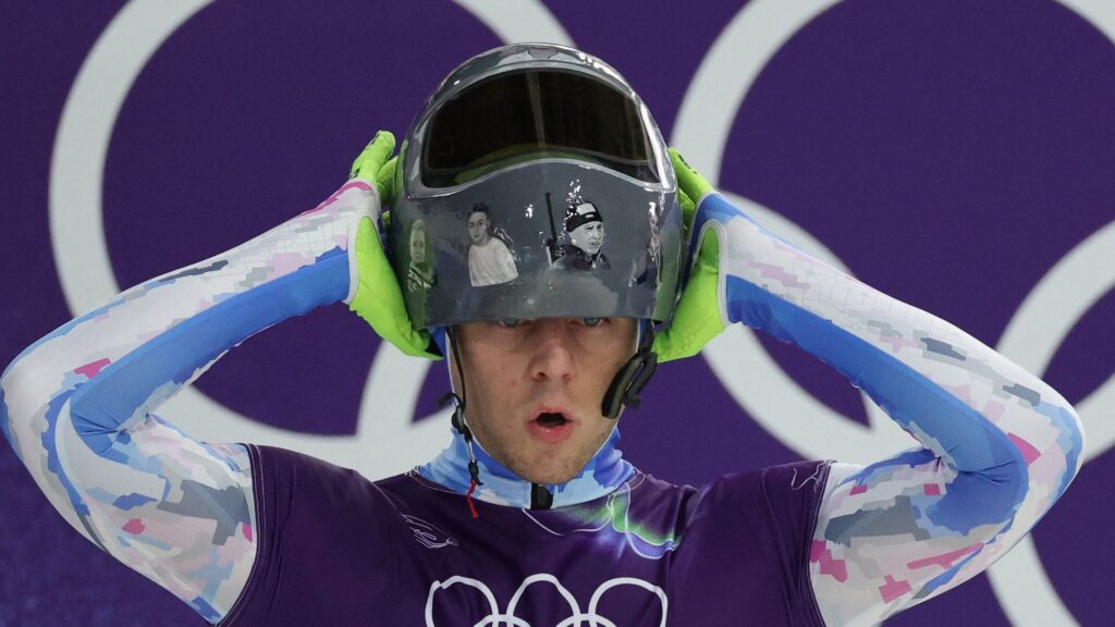 IOC disqualifies Ukrainian skeleton racer from Olympics after he refused to remove helmet honoring war victims