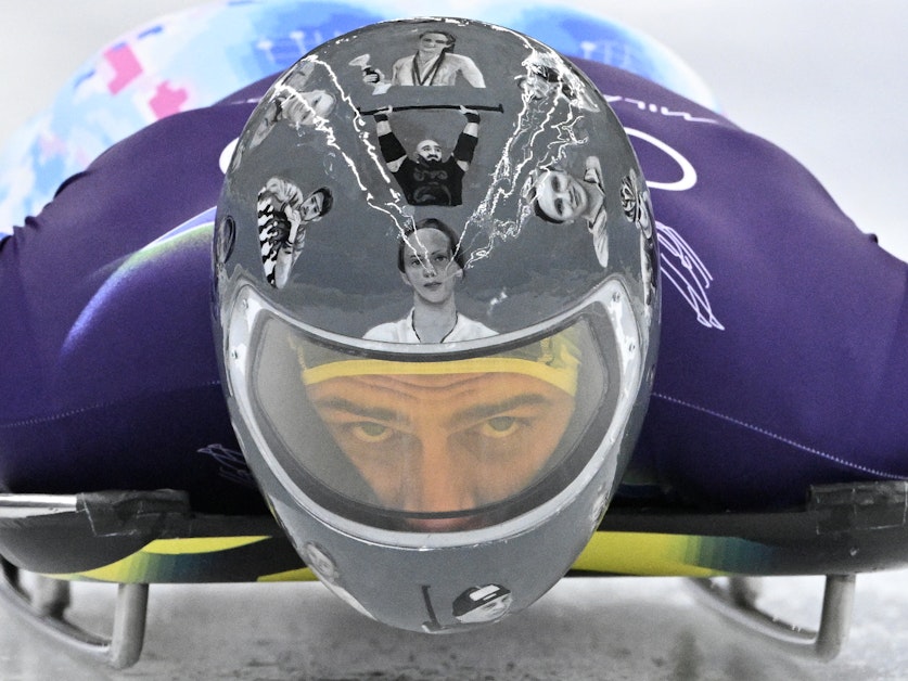 Ukrainian Olympian disqualified over images of war dead on his helmet