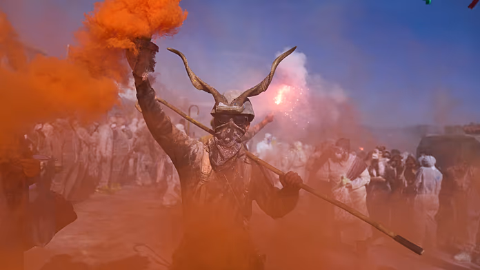 Flour war paints Greek town Galaxidi in colour for clean Monday