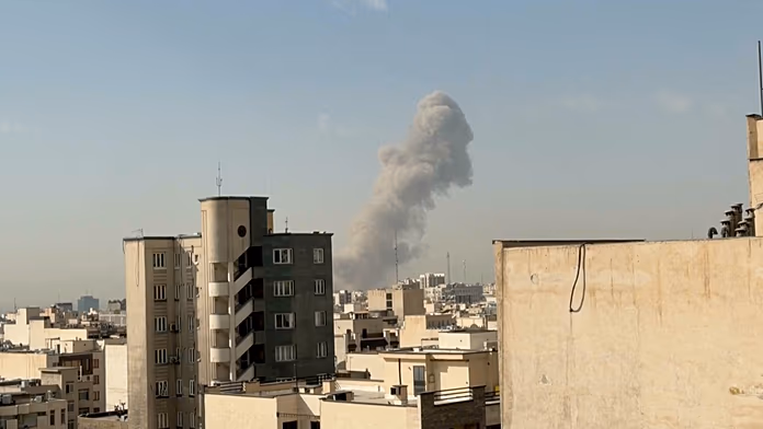 Video shows smoke rising over Jomhouri Square in Tehran following Israeli attack