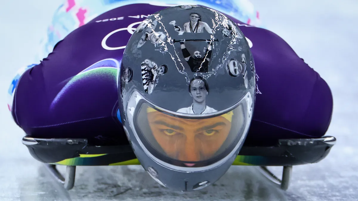 IOC bans Olympian from wearing helmet honoring athletes killed in war