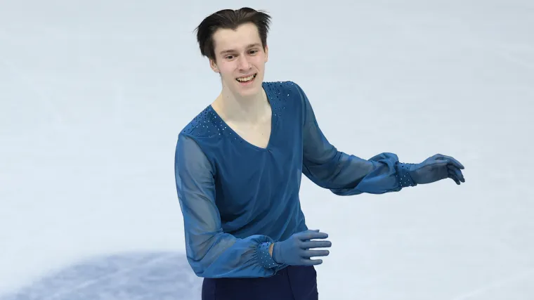 Ukraine figure skater Kyrylo Marsak skates at Olympics with his dad front of mind