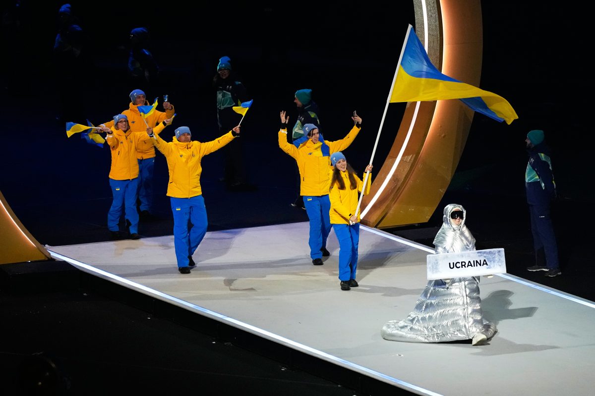 Quiet protest: Russian carried Ukraine placard at Olympics opening ceremony