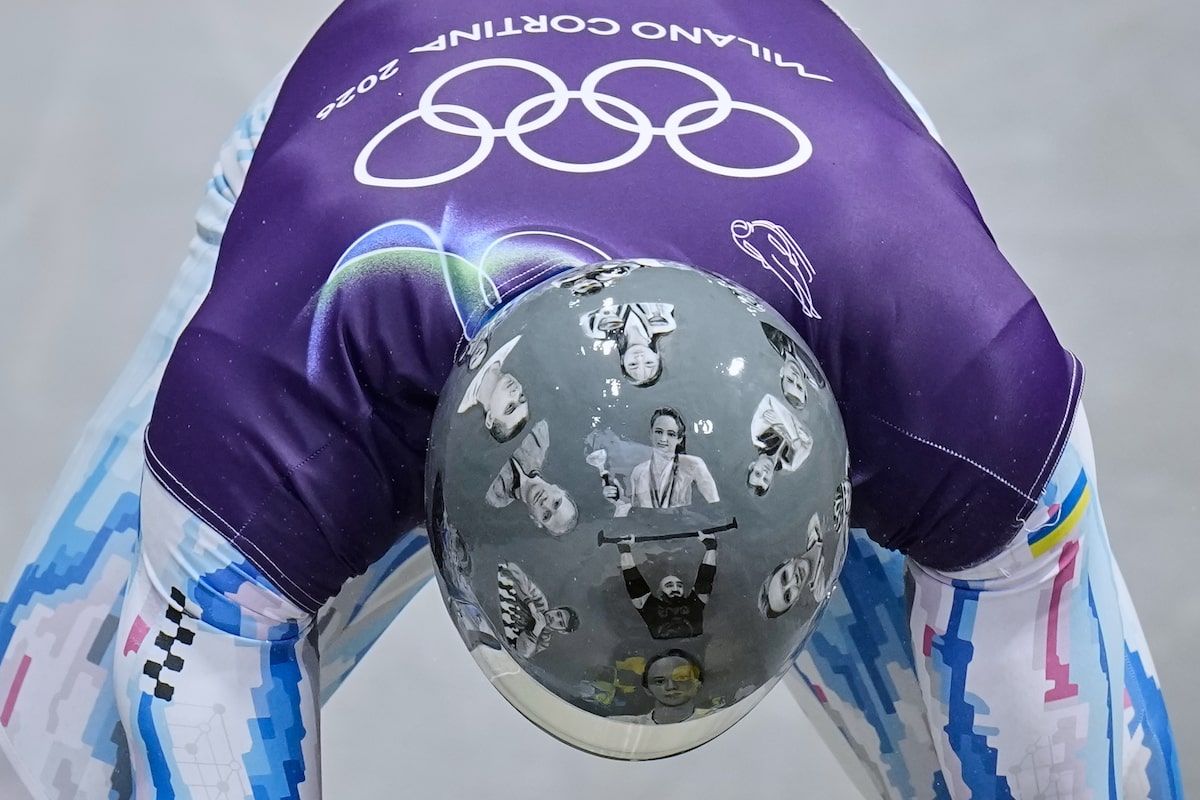 Ukrainian trains in helmet honouring fellow athletes killed in war; IOC says it’s banned for race